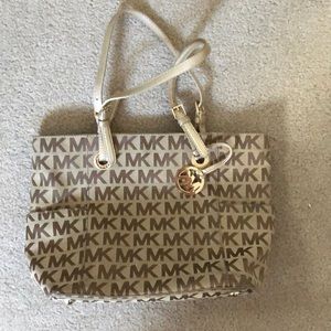 Mk tan and gold tote